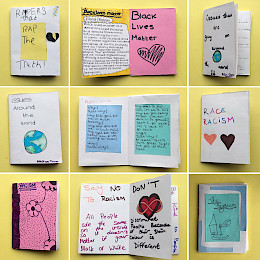 A collection of booklets and poetry displayed on a yellow background